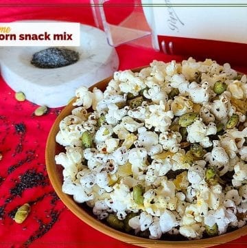 bowl of popcorn snack mix with text overlay "sesame popcorn snack mix"
