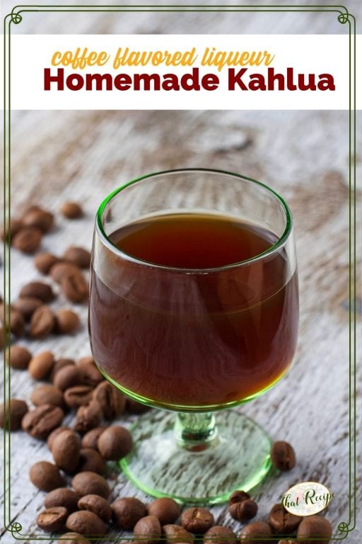 glass of liqueur on a table with coffee beans and text overlay "coffee flavored liqueur Homemade Kahlua"
