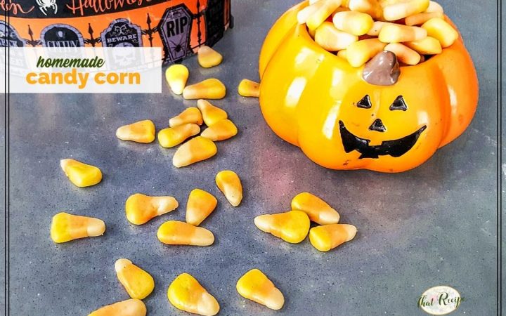homemade candy corn overflowing a container with text overlay "homemade candy corn"