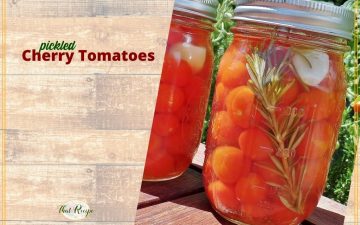 cherry tomatoes in a jar with text overlay "pickled cherry tomatoes"