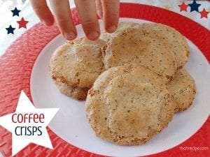 hand sneaking a cookie off of a plate with text overlay "Crispy Coffee"
