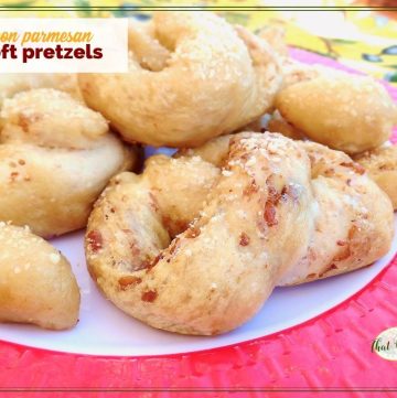 soft pretzels on a plate with text overlay "bacon sourdough soft pretzels"