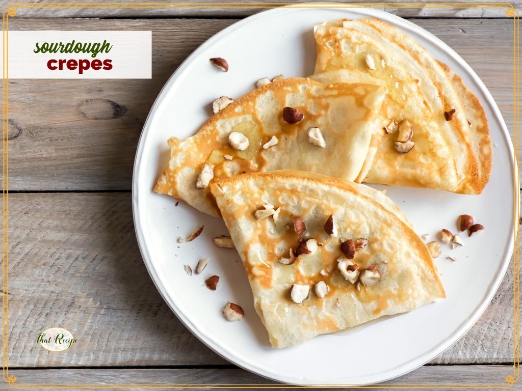 top down view of crepes on a plate with text overlay "sourdough crepes"