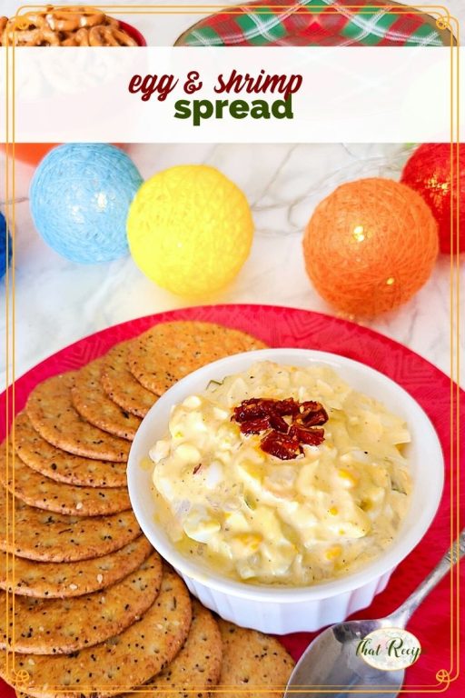 plate of crackers and egg spread with text overlay "egg and shrimp spread"
