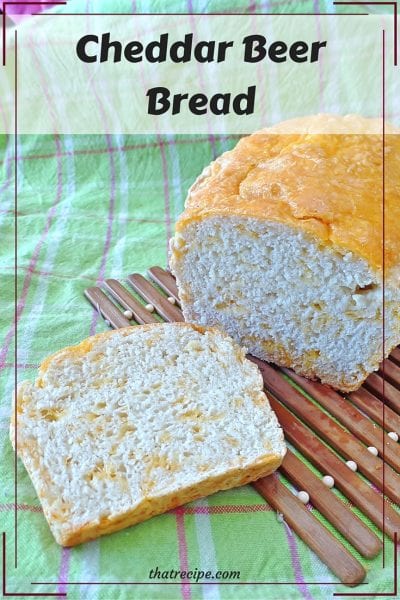 Cheddar Beer Bread - easy quick bread made with beer and loaded with cheddar cheese in and on top of the bread.