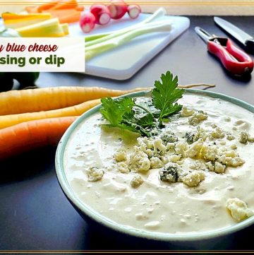 blue cheese dip in a bowl with vegetables on a cutting board and text overlay "zesty blue cheese dip or dressing"