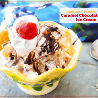 bowl of no churn sugar free caramel chocolate ice cream with whipped cream and a cherry on top.