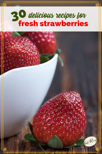 strawberries in a bowl on a wooden table with text overlay "30 delicious fresh strawberry recipes"