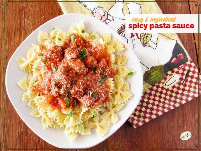 Bow tie pasta on a plate covered in sausage pasta sauce with text overlay "Easy 5 Ingredient Pasta Sauce