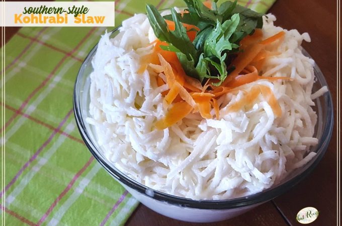 Kohlrabi Slaw with carrot and kale garnish in a bowl