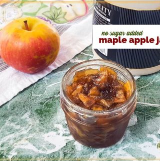 apple jam in a jar with maple syrup and apple and text overlay "no sugar added maple apple jam"
