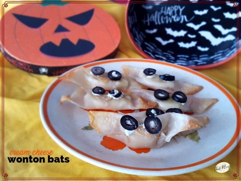 cream cheese wonton bats on a blate