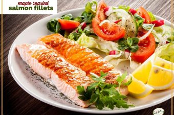 roasted salmon on a plate with a salad and text overlay "maple roasted salmon fillets"