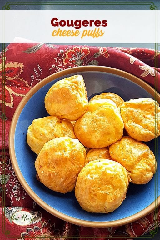 plate of cheese puffs with text overlay "Gougeres cheese puffs"