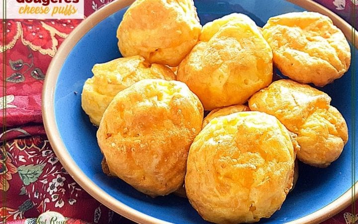 plate of cheese puffs with text overlay "Gougeres cheese puffs"