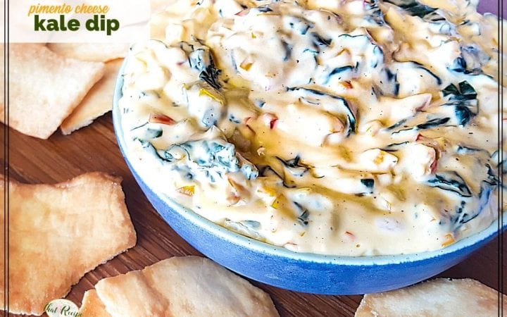bowl of dip on a table surrounded by chips and text overlay "pimento cheese kale dip"