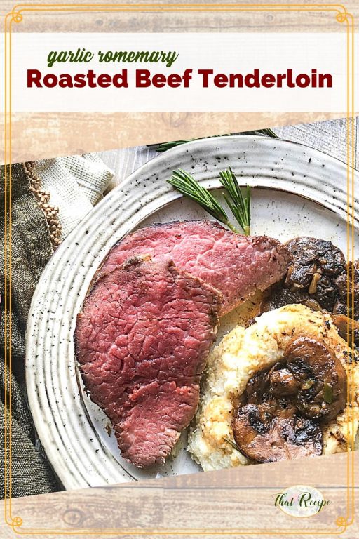 top down view of slice of beef with potatoes and mushrooms on a plate with text overlay "rosemary and garlic roasted beef tenderloin"