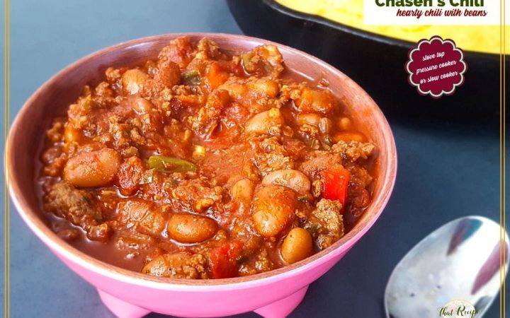 bowl of chili in front of pan of cornbred with text overlay "Chasen's Chili hearty chili with meat stove top, pressure cooker or slow cooker"