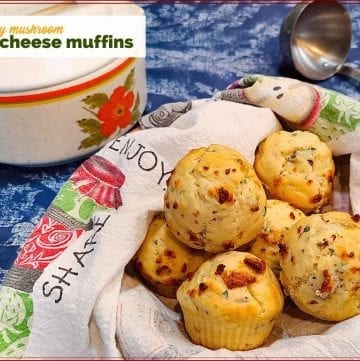 muffins on a plate with text overly "savory mushroom blue cheese muffin"