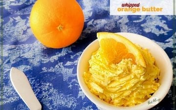 orange butter in a dish with text overlay "whipped orange butter"