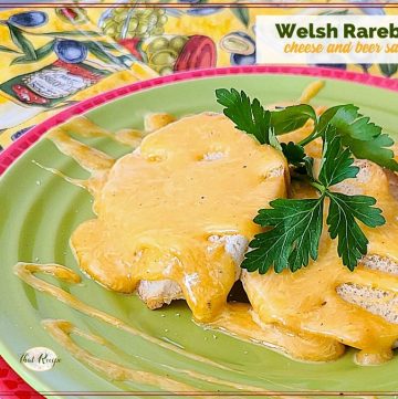 toast with cheese sauce on a plate and text overlay "Welsh Rarebit cheese and beer sauce"