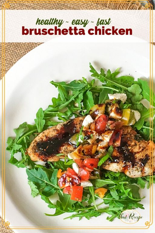 chicken breast on a bed of arugula with text overlay "healthy wast fast bruschetta chicken"