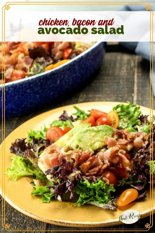 salad on a plate with text overlay "chicken, bacon and avocado salad"