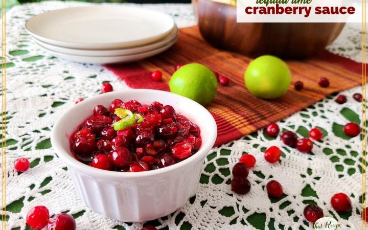 bowl of cranberry sauce on a table with text overlay "tequila lime cranberry sauce"