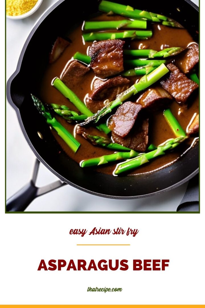 beef tips and asparagus in dark sauce in a skillet