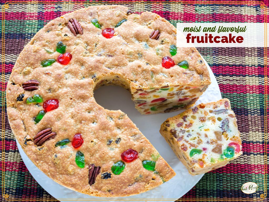 Sliced fruitcake on a plate with text overlay "moist and delicious fruitcake"