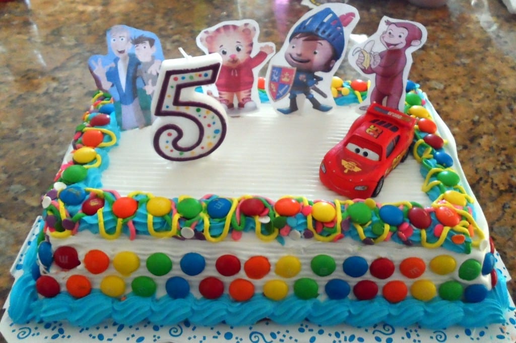 The lazy moms birthday cake: premade ice cream cake, m&ms, printed some of his favorite characters and a toy car. DONE!