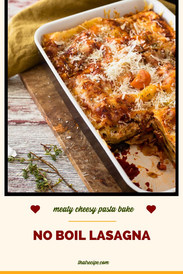 tray of meat lasagna on a wood table