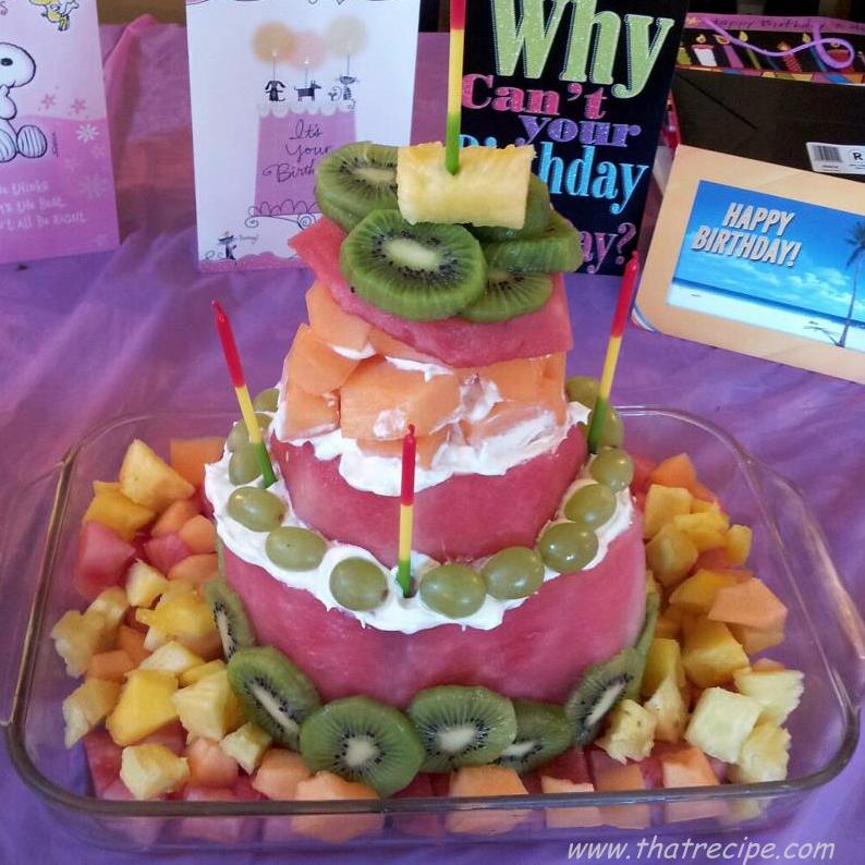 cake carved from watermelon and other fruit