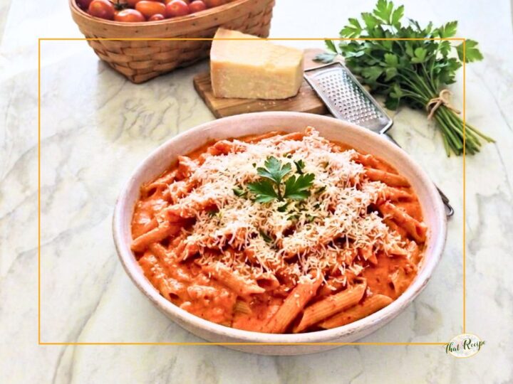 pasta alla vodka in a bowl on a marble background