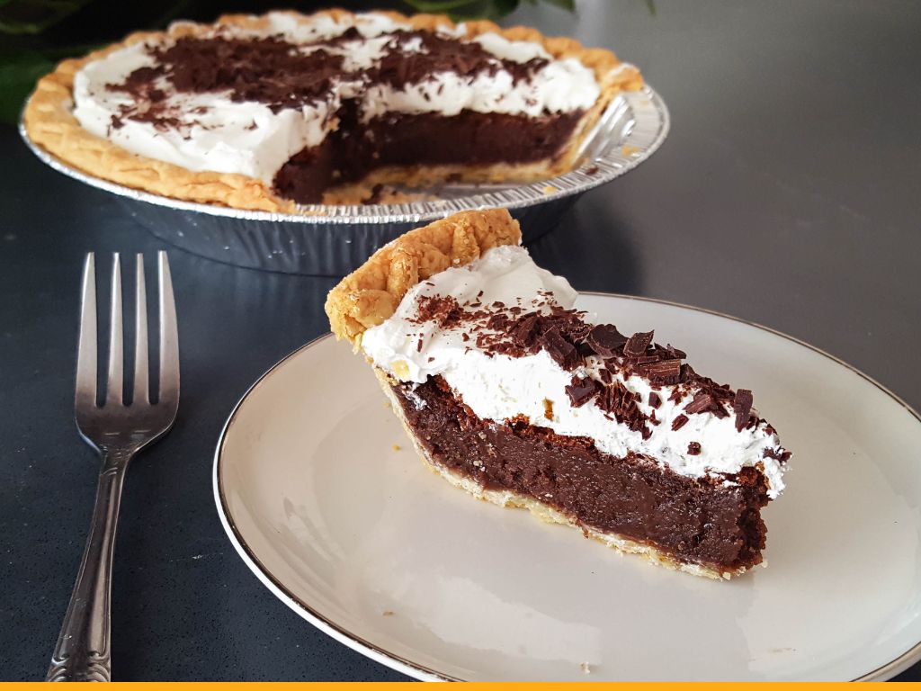 chocolate pie topped with whipped cream