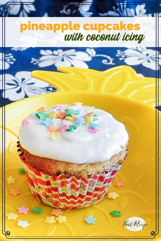 cupcake on a pineapple plate with sprinkles and text overlay "Pineapple cupcakes with coconut icing"