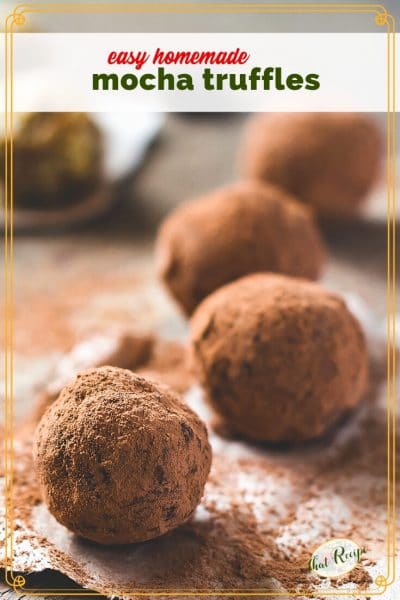 truffles rolled in cocoa powder on a board with tect overlay "easy homemade mocha truffles"