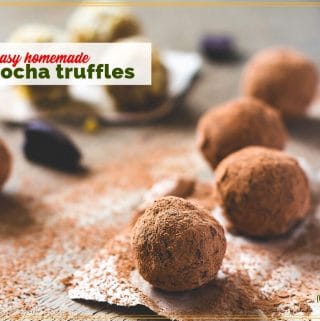 truffles rolled in cocoa powder on a board with tect overlay "easy homemade mocha truffles"