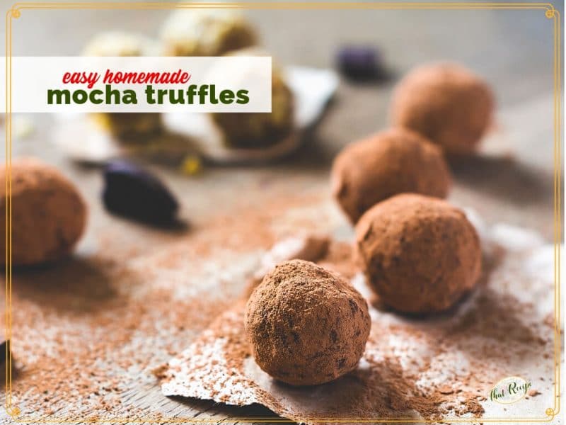 truffles rolled in cocoa powder on a board with tect overlay "easy homemade mocha truffles"