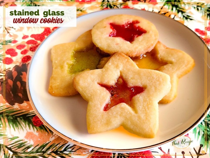 Christmas Cookies on a plate with text overlay "stained glass window cookies"