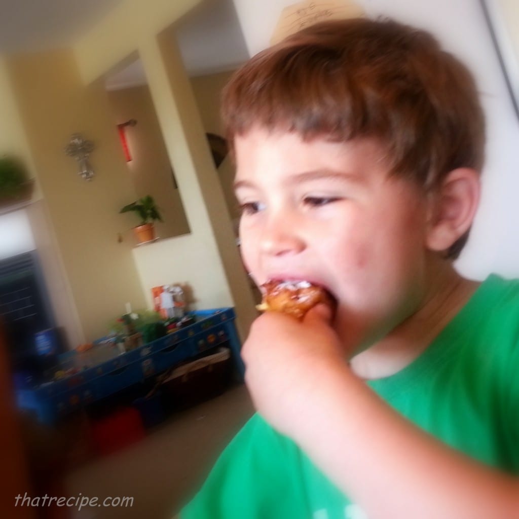 Boy eating Beignets - thatrecipe.com