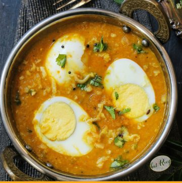 boiled egg halves in curry sauce