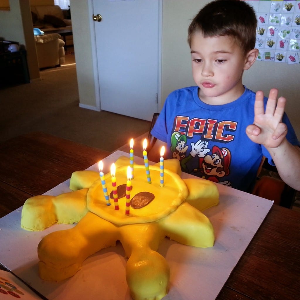 birthday boy with shine sprite cake - thatrecipe.com