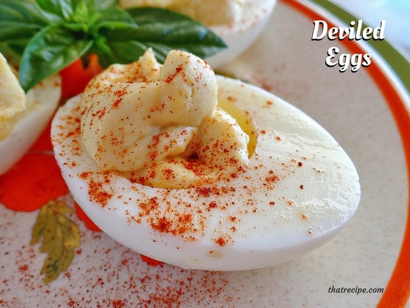 deviled egg sprinkled with paprika