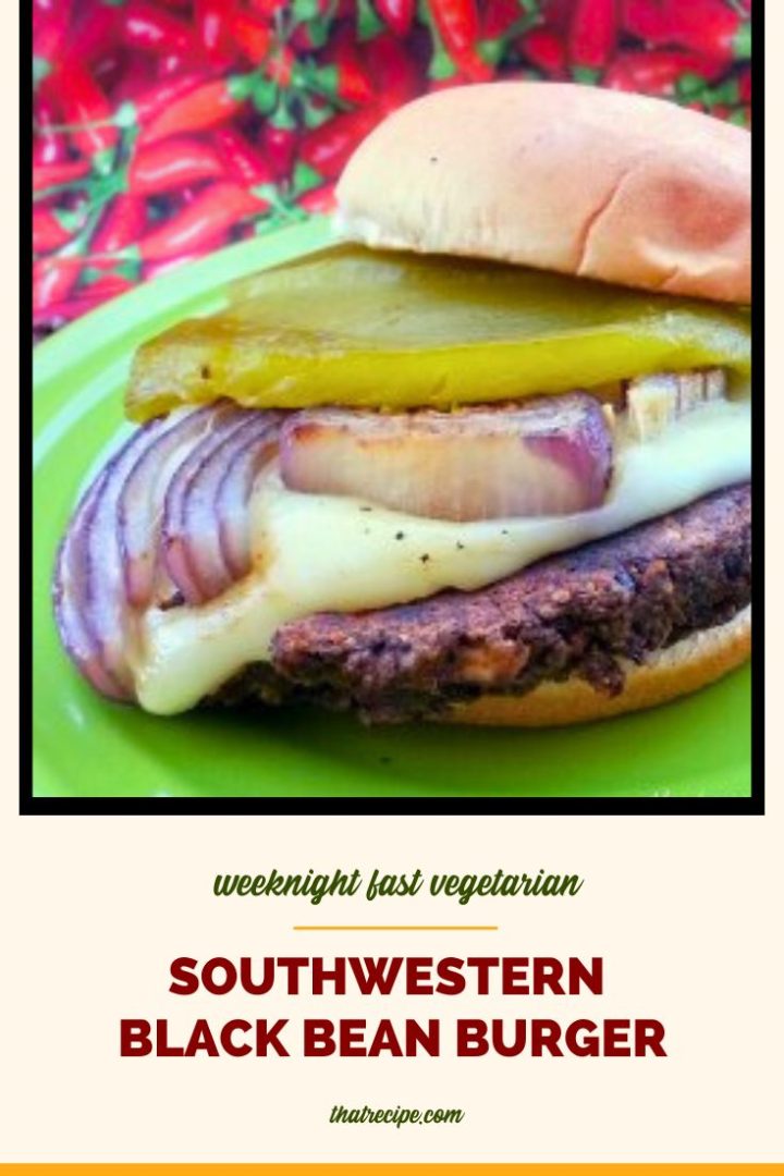 burger topped with chili and grilled red onion slice