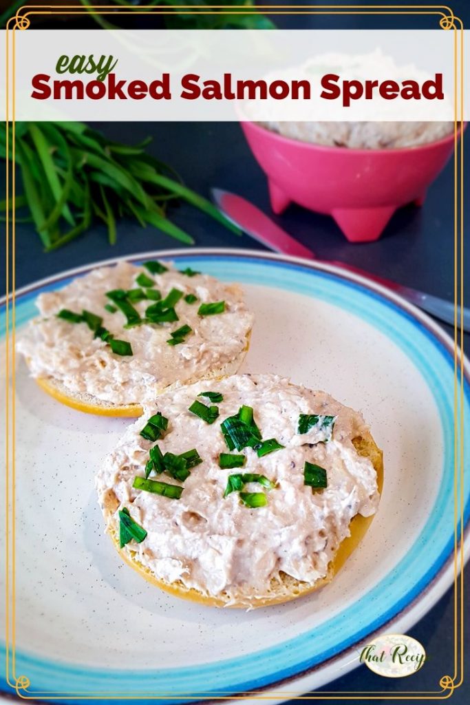 smoked salmon spread on a bagel with a bowl of smoked salmon spread in a pink bowl.