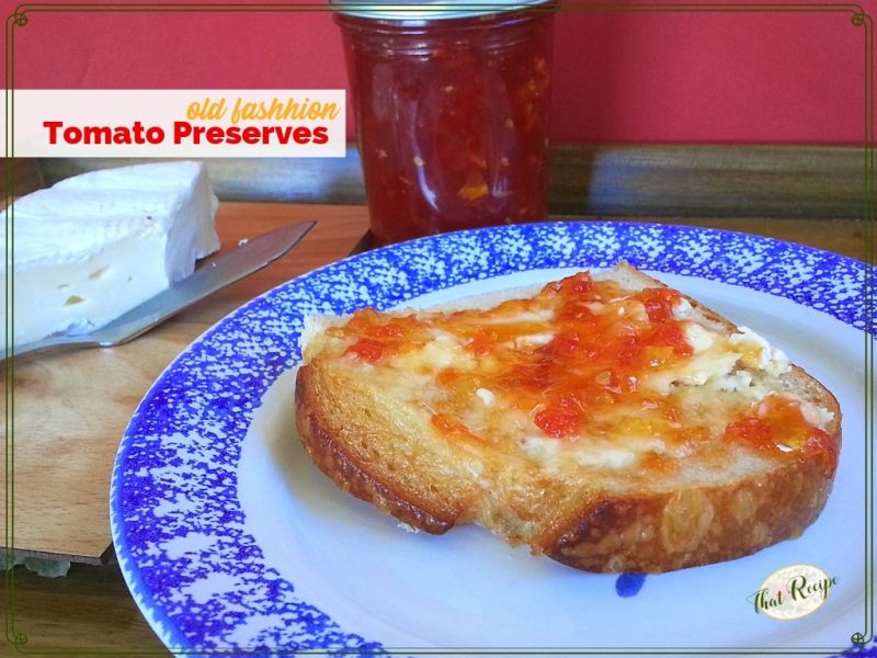 tomato jam spread on a piece of bread with text overlay "old fashioned tomato preserves"