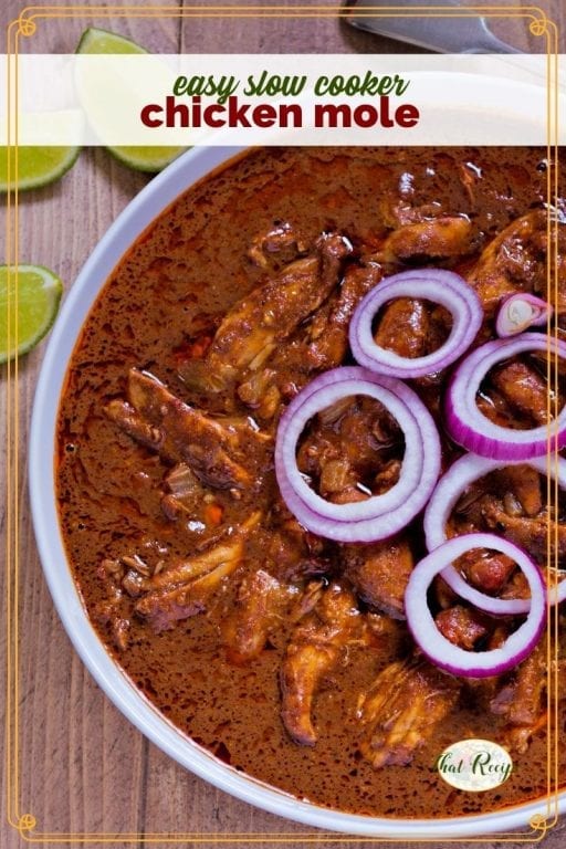 bowl of chicken in chocolate broth with text overlay "easy slow cooker chicken mole"