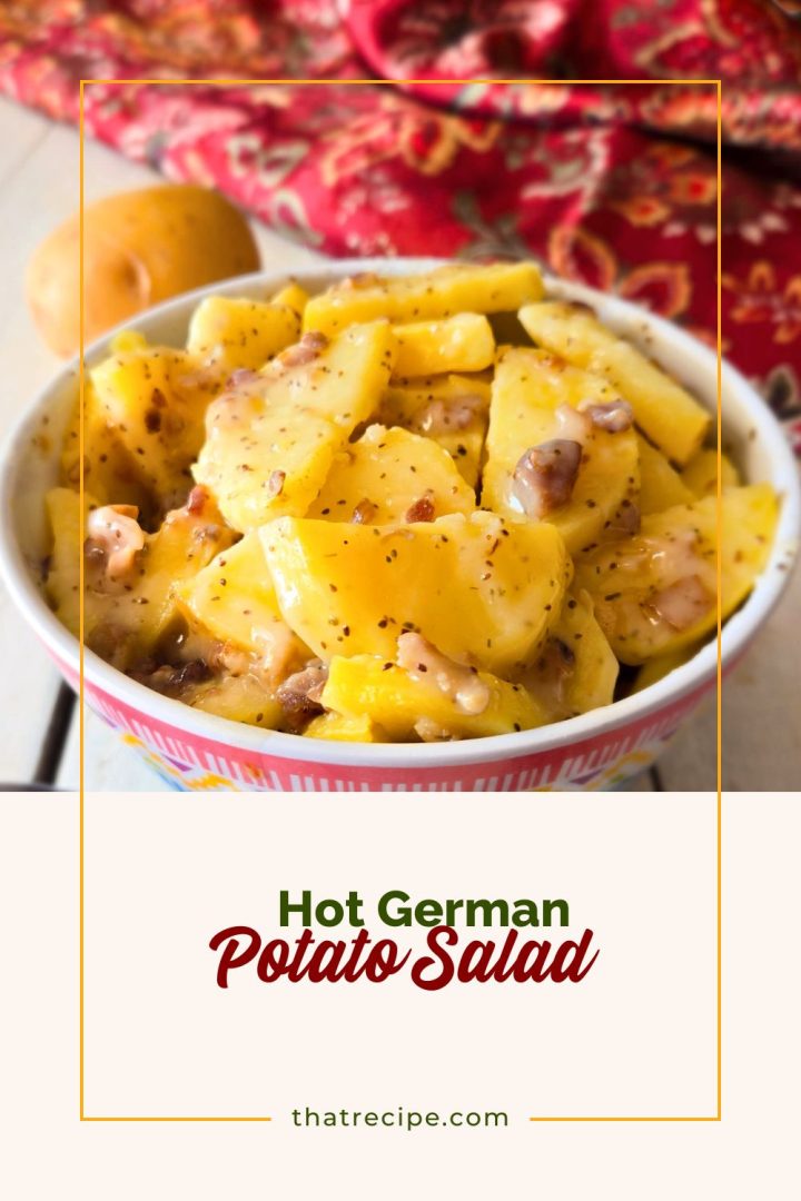 Hot German Potato Salad in a dish (sliced potatoes with creamy bacon sauce)