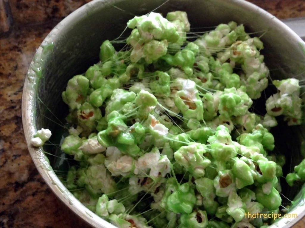 green colored marshmallow covered popcorn